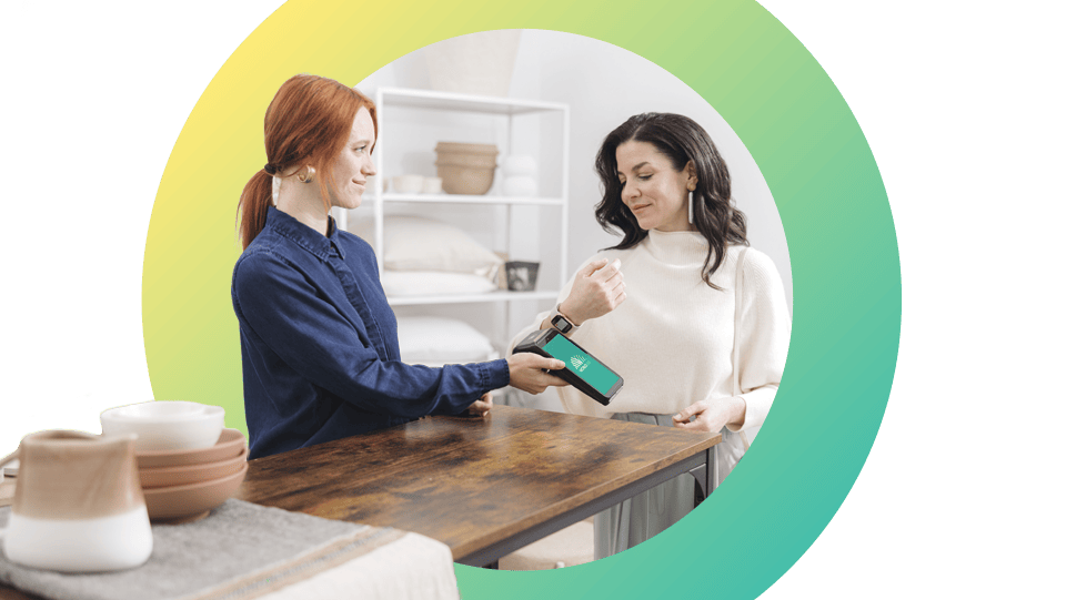 Customer paying with her watch