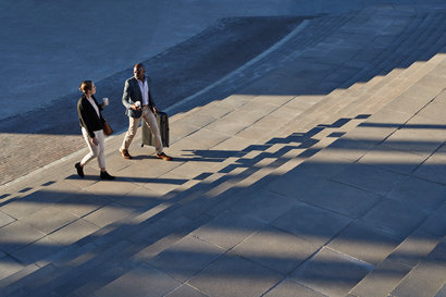 Businesspeople walking on stairs